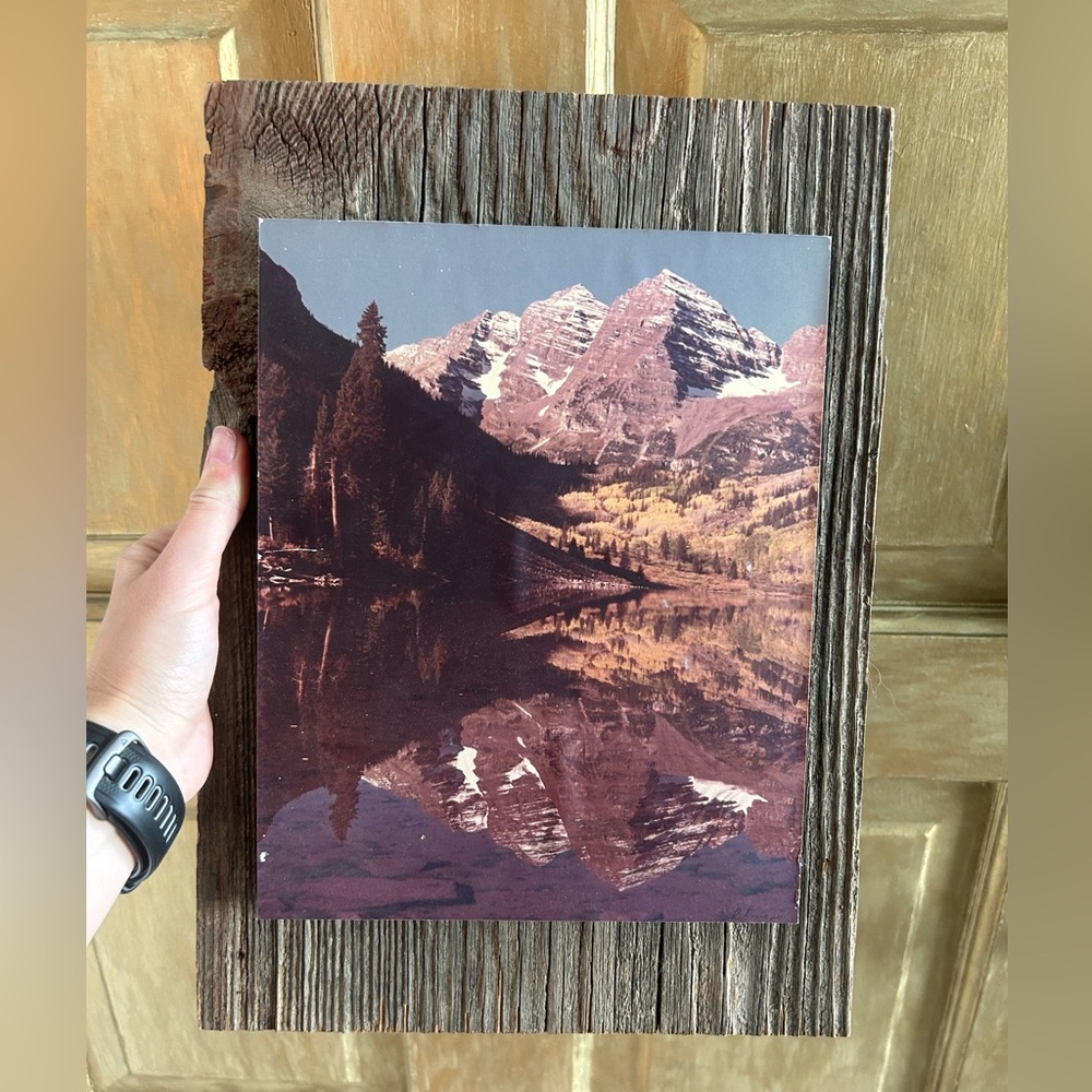 Vintage mountain scene photo on wood
